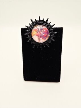 Vibrant Handcrafted Sunburst Pin with Multicolor Center